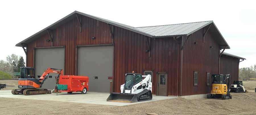 Hills Equipment Sales and Rentals yard. Mini Excavator, portable generator, and skid loader